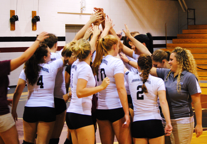 Ray, Swiderski Lead Way as Volleyball Edges Saint Rose, 3-2, On Breast Cancer Awareness Day